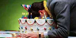 Man With Face in Birthday Cake --- Image by © Stan Fellerman/Corbis